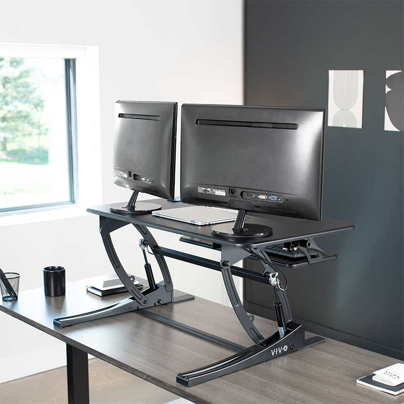 Mesa VIVO DESK-V000V - Convertidor de escritorio para trabajar de pie o sentado, ergonómico, superficie hasta 36", soporta hasta 33lbs, ajuste de altura desde 6.5" hasta 17", color negro.